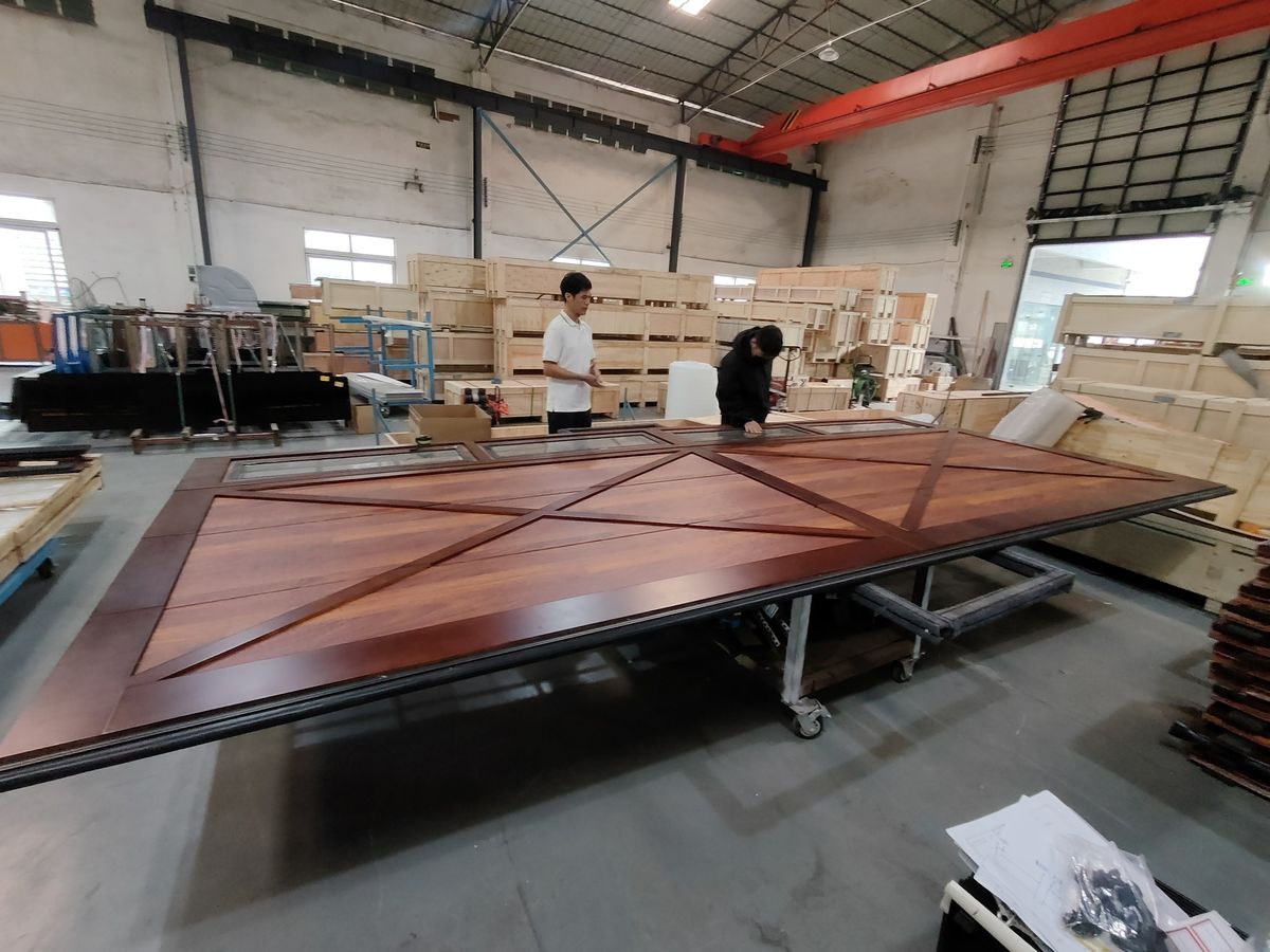 Garage door panels being assembled and quality-checked in the Sunotech factory