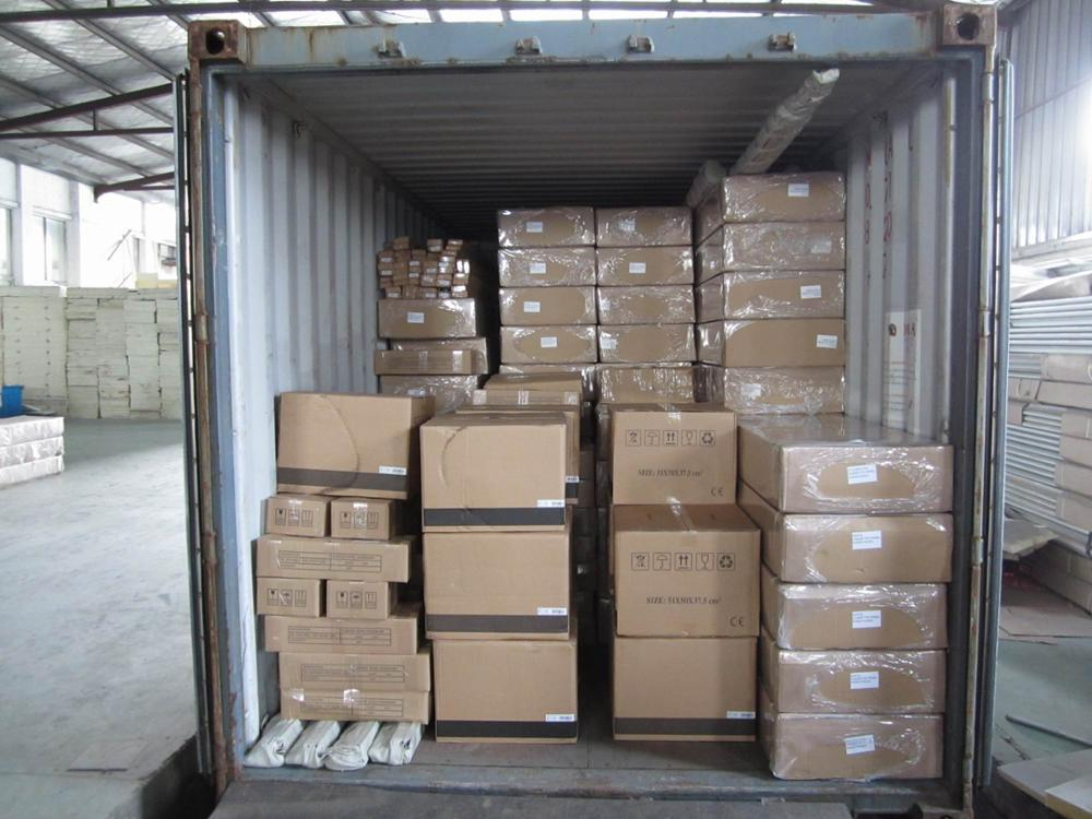 Garage doors packed in export cartons loaded into a shipping container